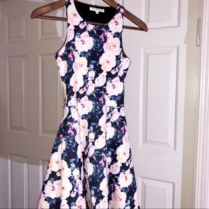 Beautiful girls dress with cut off on the back